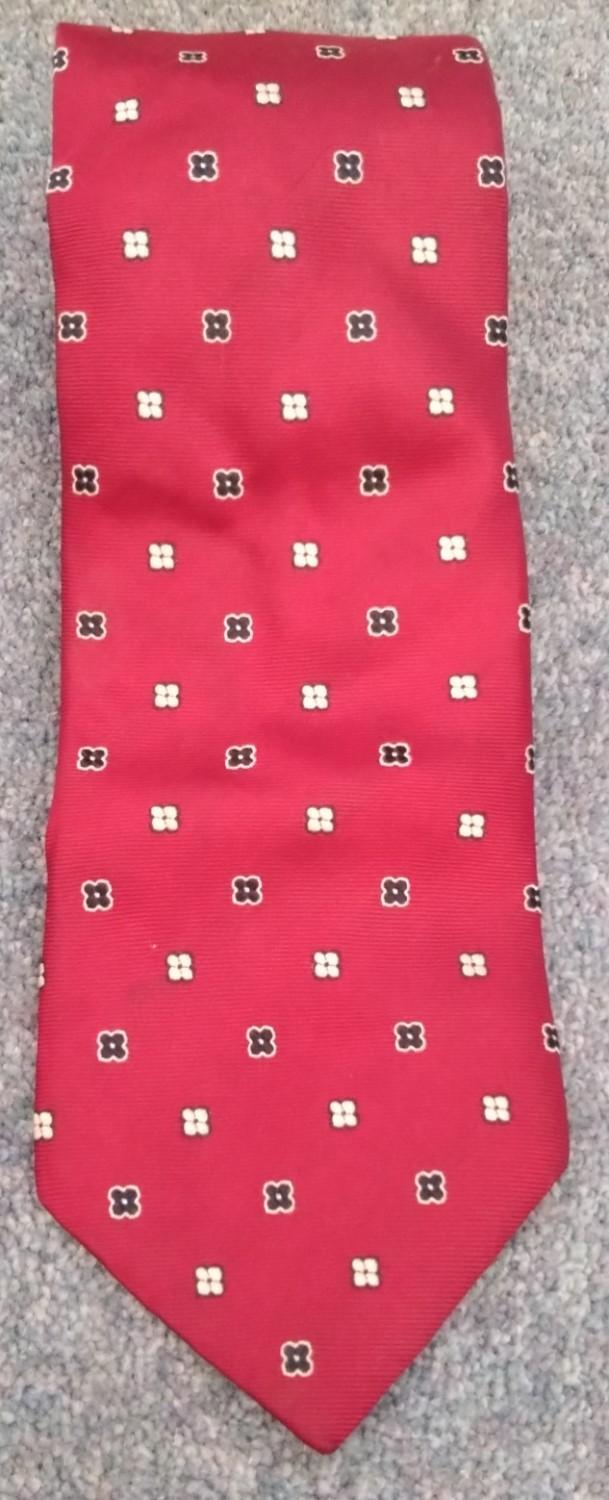 Preview of the first image of Marks and Spencer red silk patterned tie.
