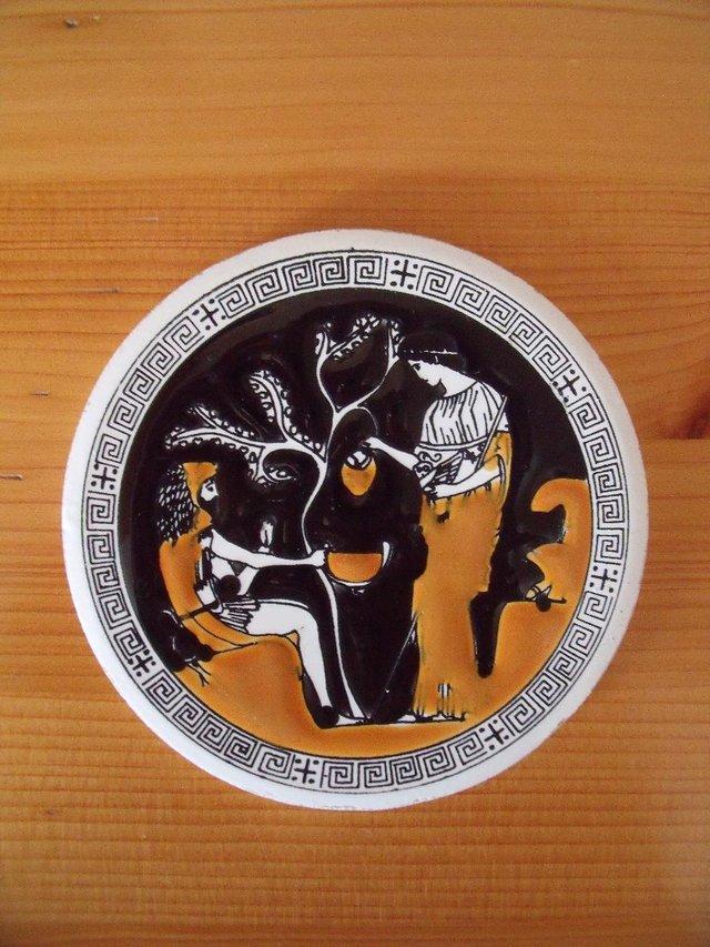Preview of the first image of Vintage hand made Greek round ceramic tile/coaster..