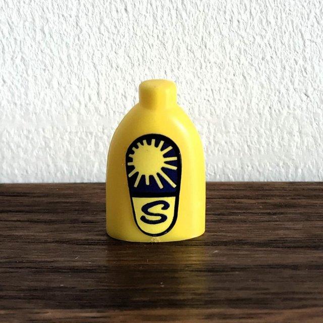 Preview of the first image of Vintage 1980's Sindy doll suntan cream bottle..