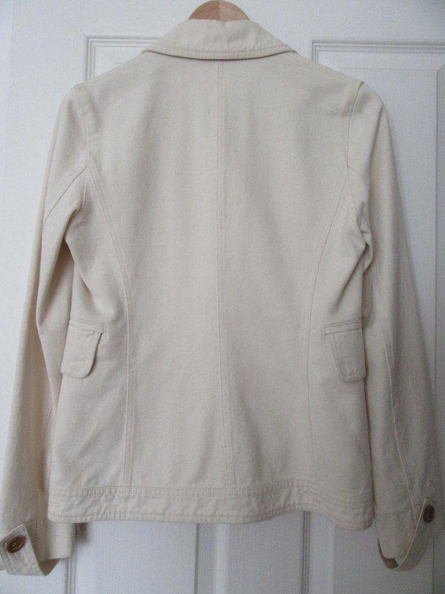 Preview of the first image of BURBERRY LADIES CREAM JACKET SIZE 10/38 - DOUBLE BREASTED.