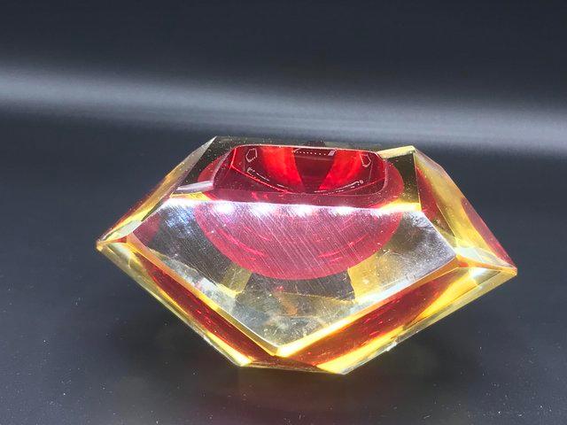 Preview of the first image of Murano Sommerso Red Amber facetted glass ashtray vintage.
