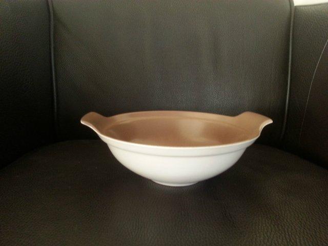 Preview of the first image of Genuine Poole Pottery Serving Dish Brown/Cream.
