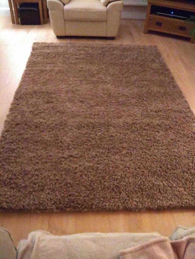 Preview of the first image of Rug. Large brand new biscuit colour.