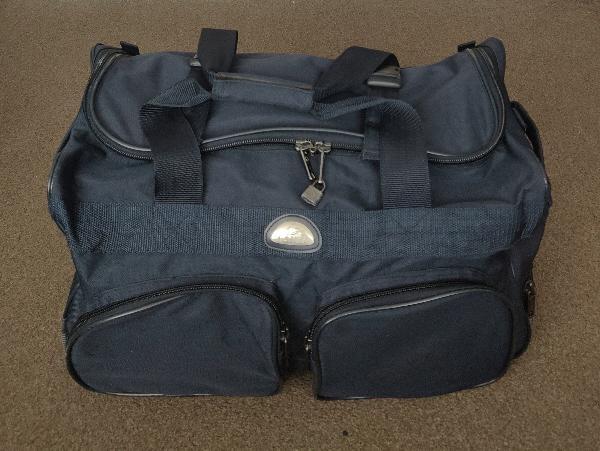 Preview of the first image of Lanza Navy Blue Wheeled Holdall With Retractable Handle.