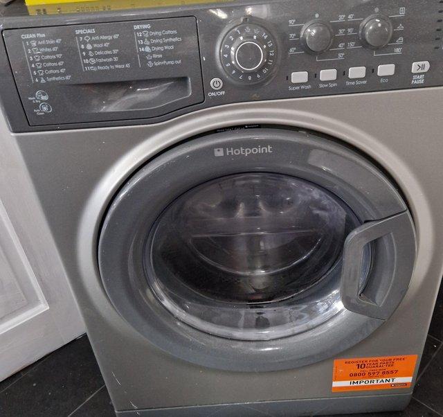Preview of the first image of Hotpoint washer dryer graphite 8kg plus 6kg.