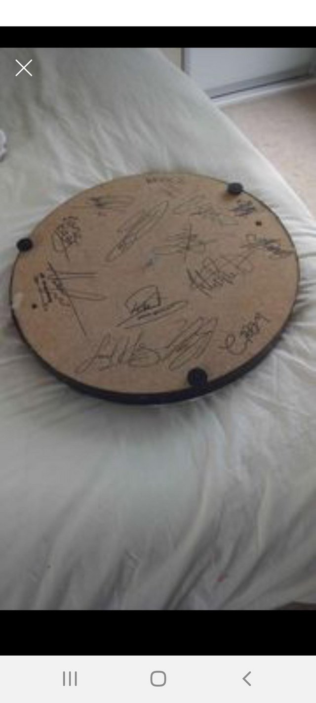 Preview of the first image of Signed dartboard for sale.
