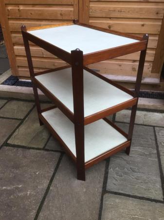 Image 2 of A vintage three tier storage rack with melamine surfaces.