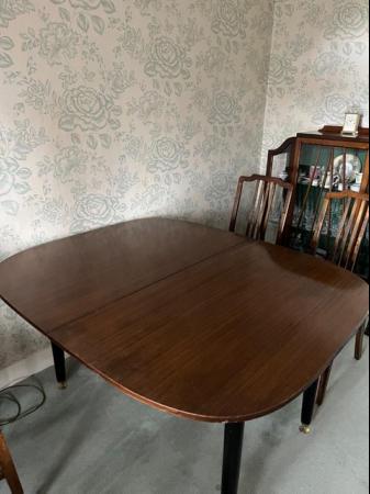 Image 2 of Dining table with extendable leaf