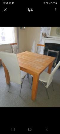 Image 3 of Solid wood dining table and 4 chairs