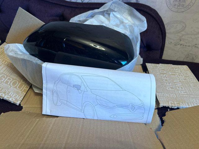 Preview of the first image of Renault capture black wing mirror covers.