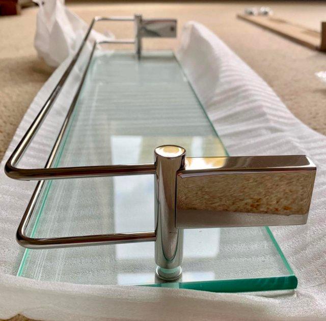Preview of the first image of Modern glass shelf with chrome sides.