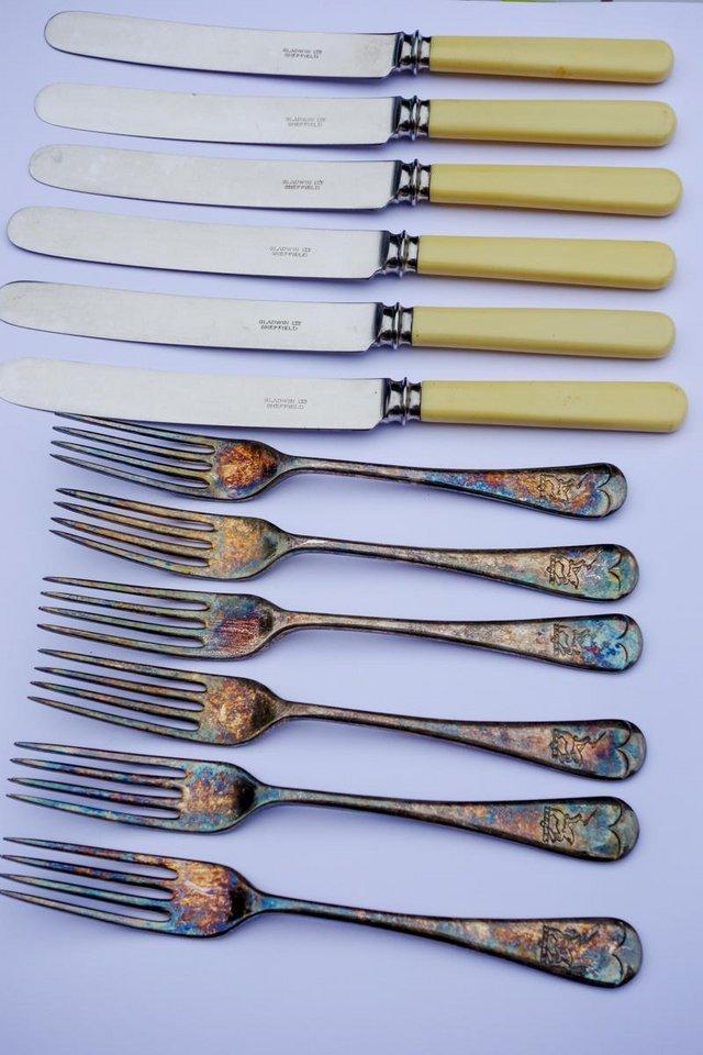 Preview of the first image of 1950's set of unused six knives and forks manuf by Gladwin.