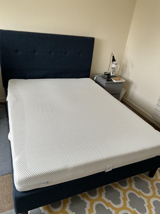 Preview of the first image of Moving out sale: King size bed with IKEA ABYGDA mattress.