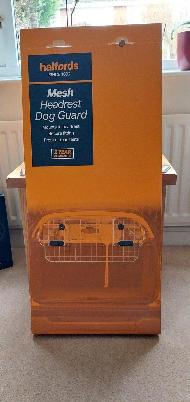 Preview of the first image of Halfords car dog guard.Highley re.