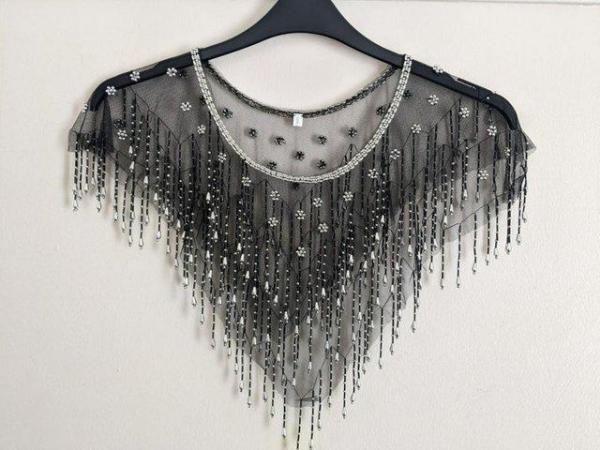 Image 1 of Black beaded fancy poncho, as new