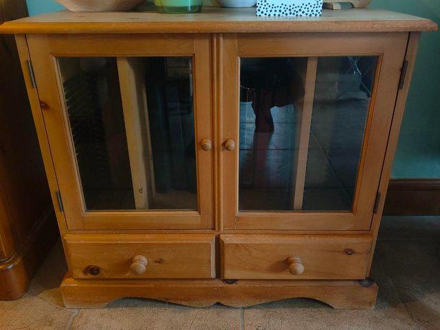 Preview of the first image of TV/Hi Fi Unit Pine Wood with glass doors.