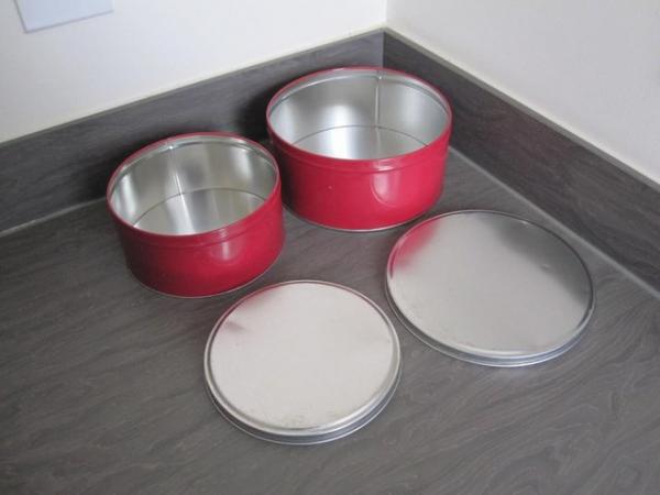 Image 2 of Two red kitchen cake tins small and medium
