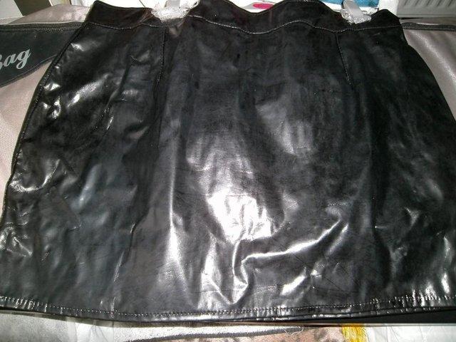 Preview of the first image of Mini Skirt Black PVC Shiny Plus Size Honour Brand.