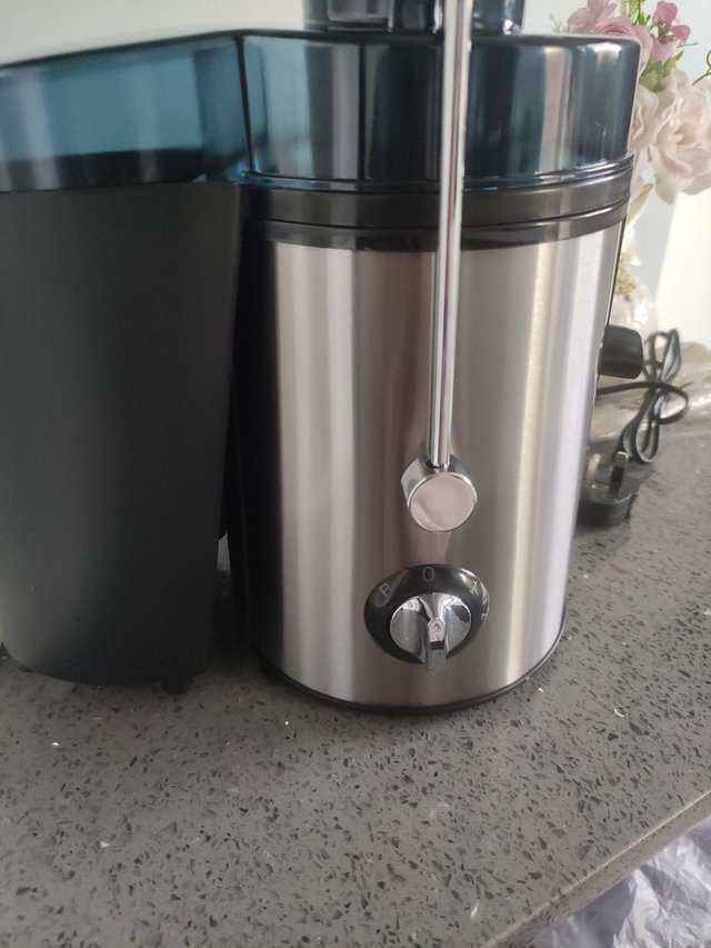 Preview of the first image of Healthy Living Brand New Juice Extractor.