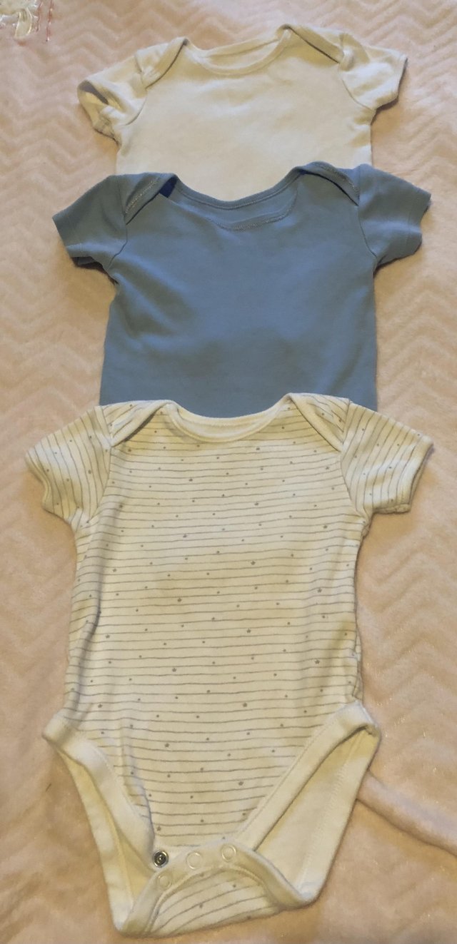 Preview of the first image of Set of three boys baby grows.