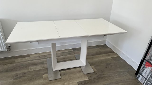 Preview of the first image of Modern, stylish and practical extendable dining table.