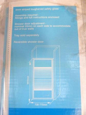 Image 1 of Reversible shower door New and unused