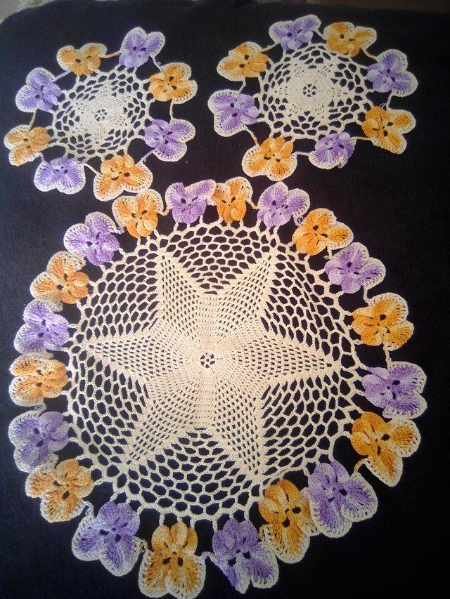 Preview of the first image of SET OF 3 VINTAGE PURPLE PANSY DESIGN CROCHETED DOILIES.