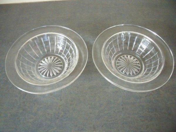 Image 1 of 2 identical decorative vintage clear glass bowls/dishes.