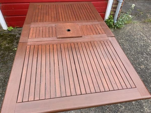 Image 2 of Solid wood folding garden table for six people.