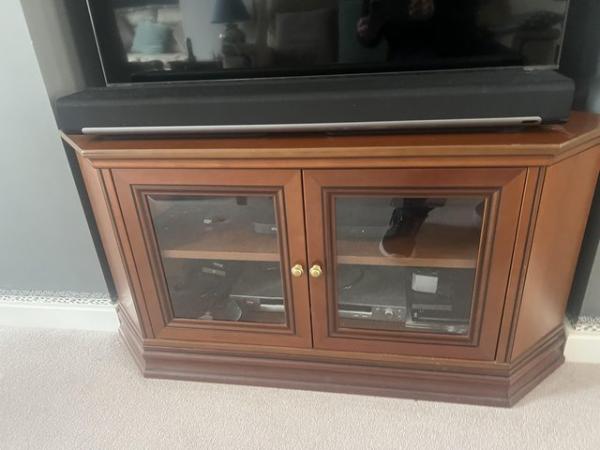 Image 1 of Bradley tv stand and cabinet.