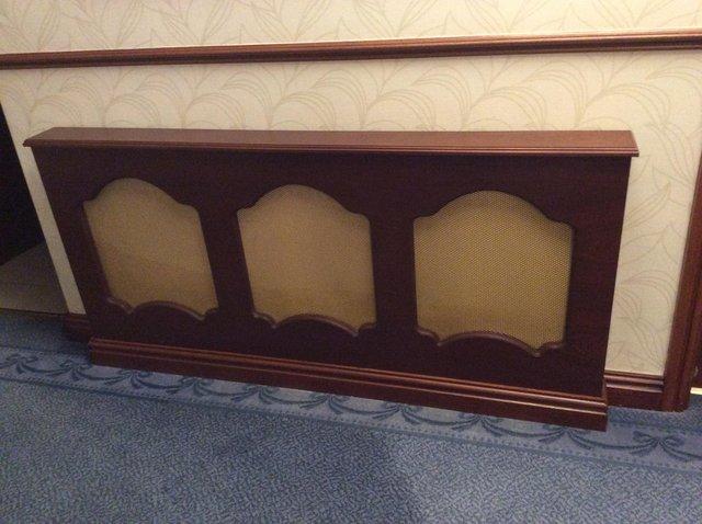 Preview of the first image of Radiator covers mahogany with gilt grid.