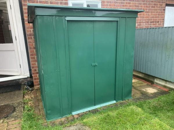 Image 3 of Metal storage shed with lockable sliding doors