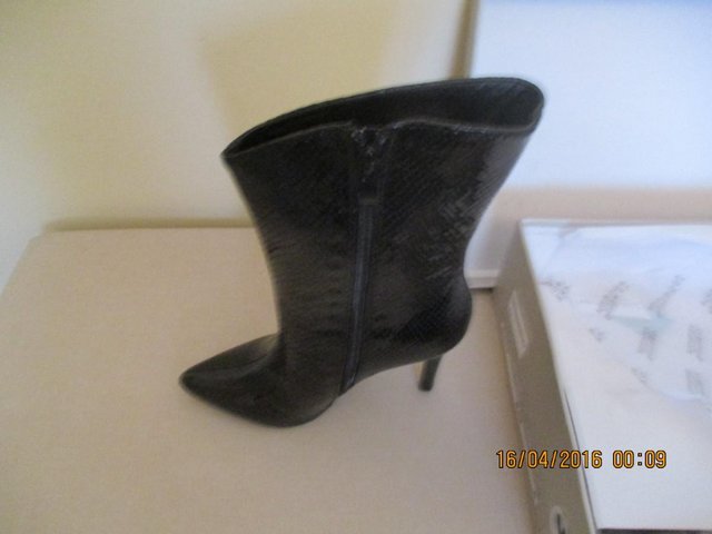 Preview of the first image of Brand New Ladies Boots - size 3.