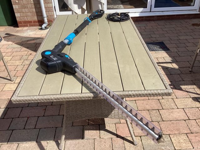 Preview of the first image of Mc Alister electric hedge trimmer and strimmer.