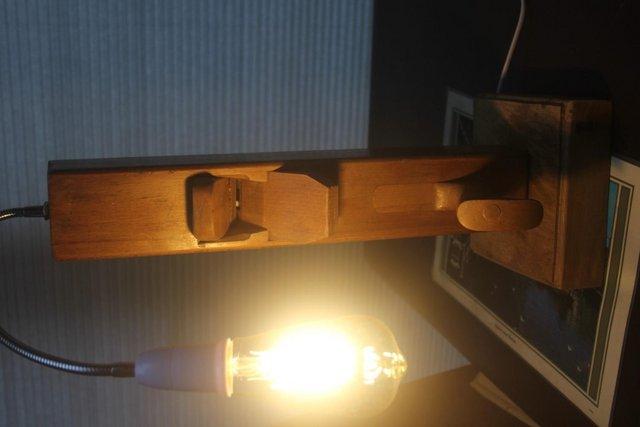 Preview of the first image of Vintage Upcycled wood plane to a light.