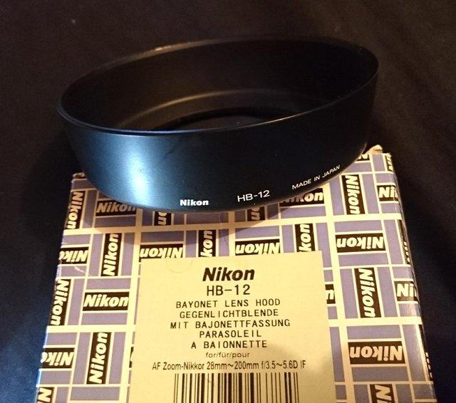 Preview of the first image of Nikon HB 12 Lens Hood (Genuine).