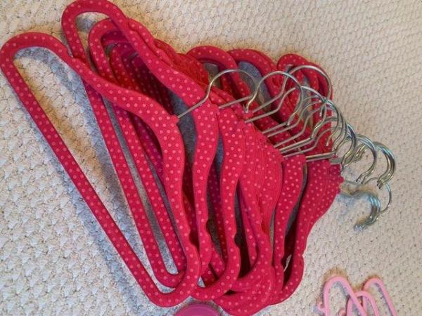 Image 2 of A good selection of young girl’s pink hangers