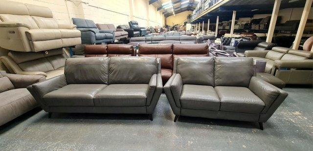 Preview of the first image of Ex-display Fellini grey leather 3+2 seater sofas.