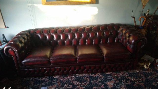 Image 2 of 4 seater ox blood leather chesterfield sofa