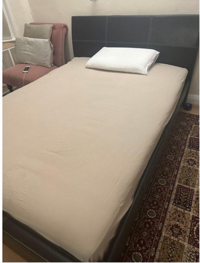 Preview of the first image of Double bed with mattress for sale.