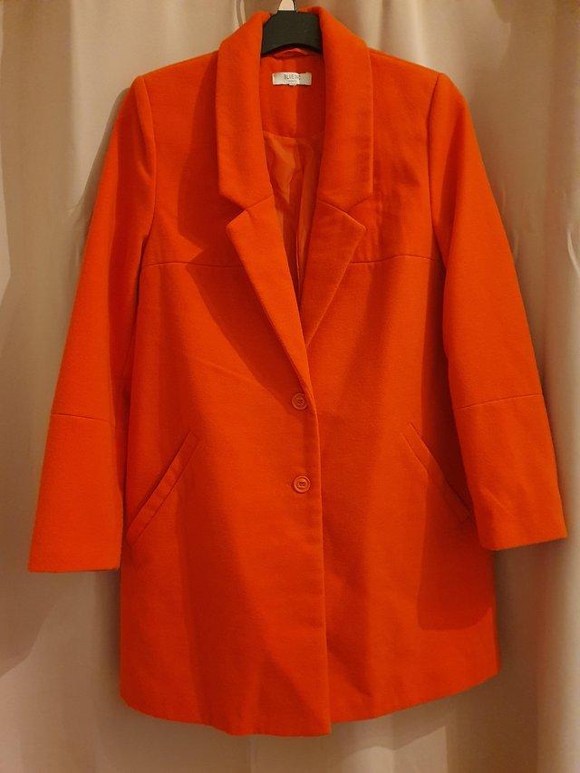 Preview of the first image of Orange/Red Womens Blazer Coat, Blue Inc size 16.