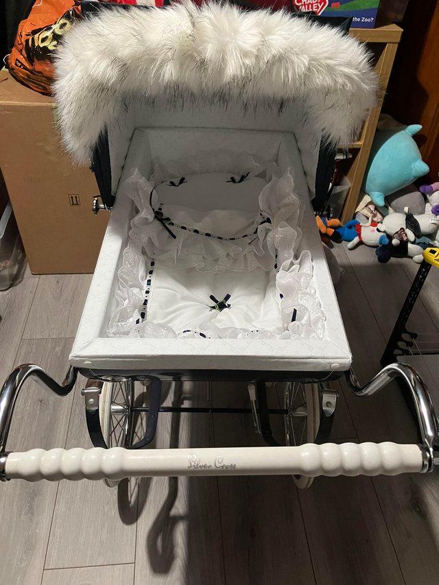 Preview of the first image of A Silver cross baby dolls pram.