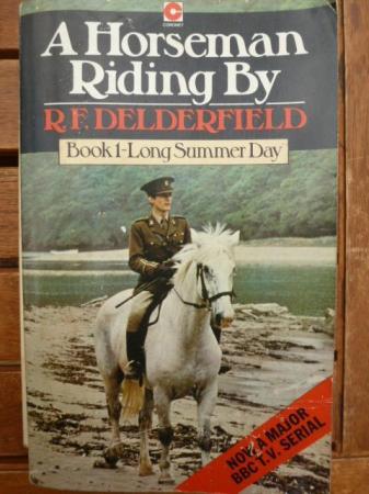 Image 1 of Battered paperback  A horseman riding by