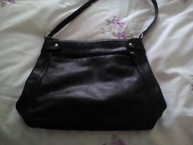 Preview of the first image of Black hand bag. Good condition.