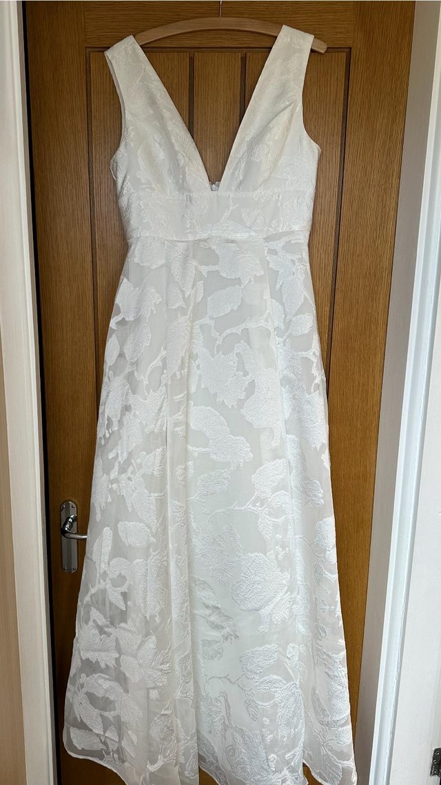 Preview of the first image of Coast wedding dress- size 14 BNWT.