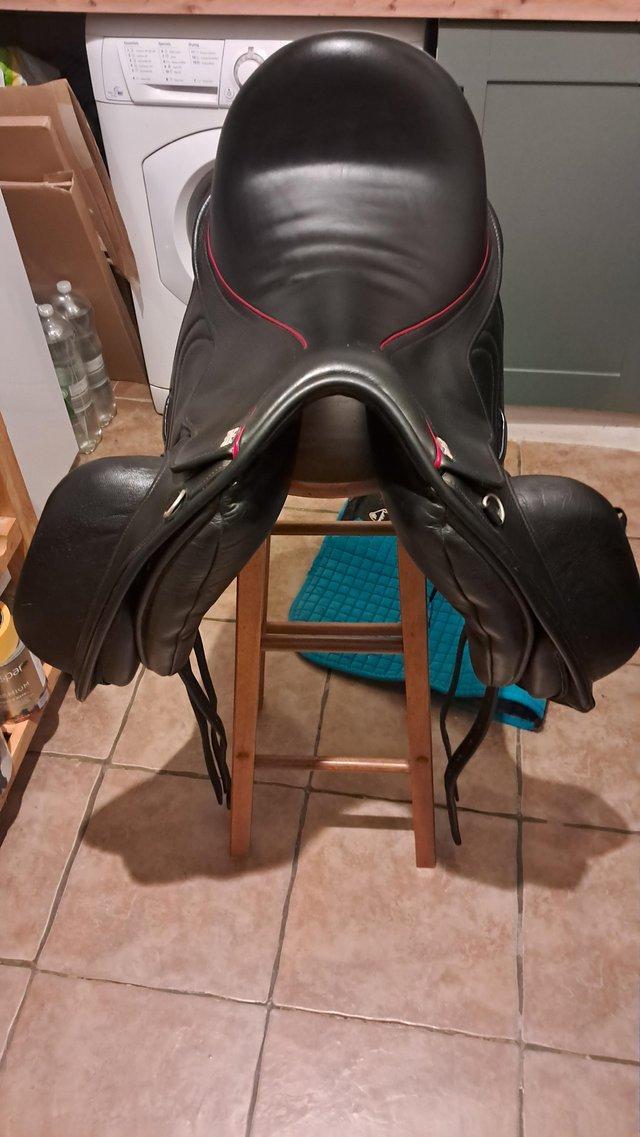 Preview of the first image of Black Sue carson secret weapon dressage saddle for sale.