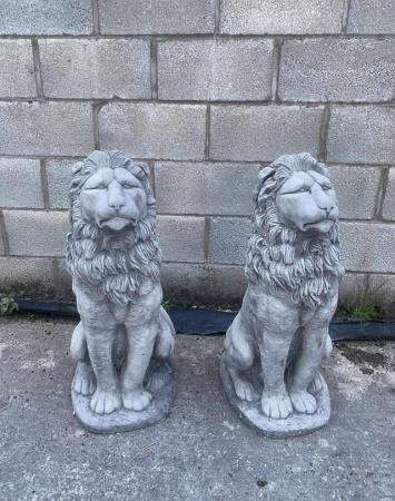 Image 1 of Two very large sitting lions