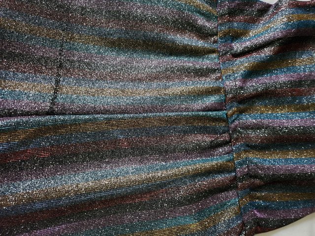 Preview of the first image of Kids sparkly stripe jumpsuit aged 9yrs.