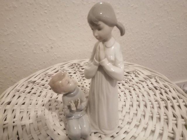 Preview of the first image of Porcelain Llardo mother & child praying.