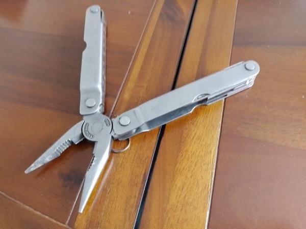 Image 1 of Leatherman multitool for sale. early piece.
